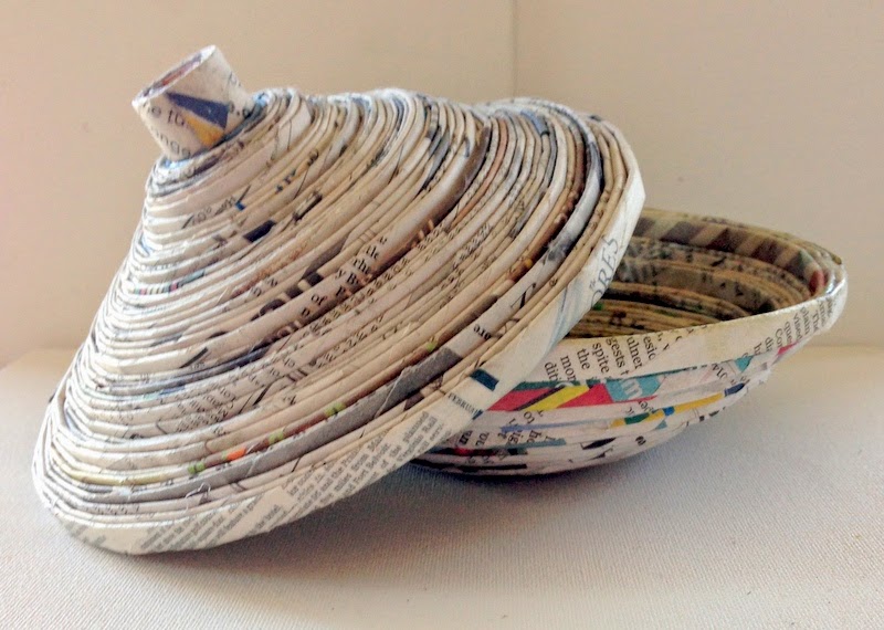 Newspaper and yarn chandelier