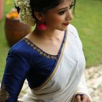 Gajra bun hairstyle which go perfectly with a saree