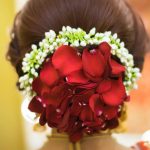 Floral Bun Ideas Adorned With Real Rose Petals Rose petals to highlight bridal buns