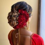 7 Hairstyle Ideas Perfect For The Brides Who Love Wearing Roses Rose Flowers arrangement for bridal hairstyle